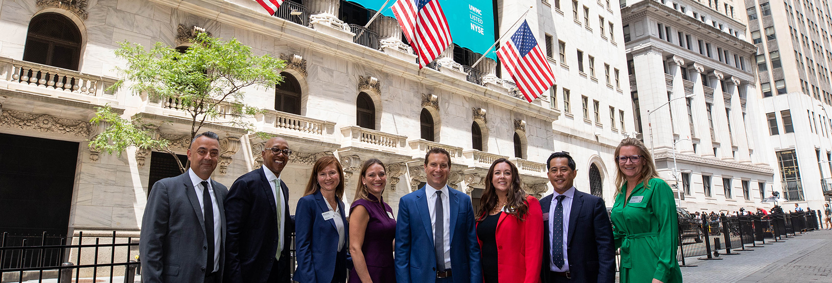 A photo of the UWM executives on Wall Street