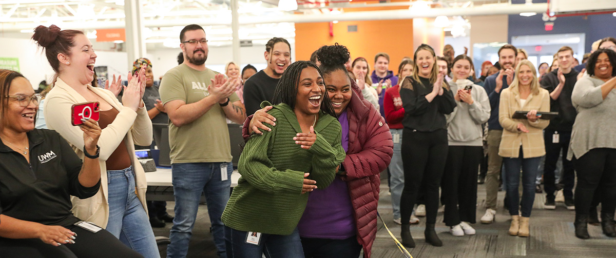 UWM team members celebrating each other