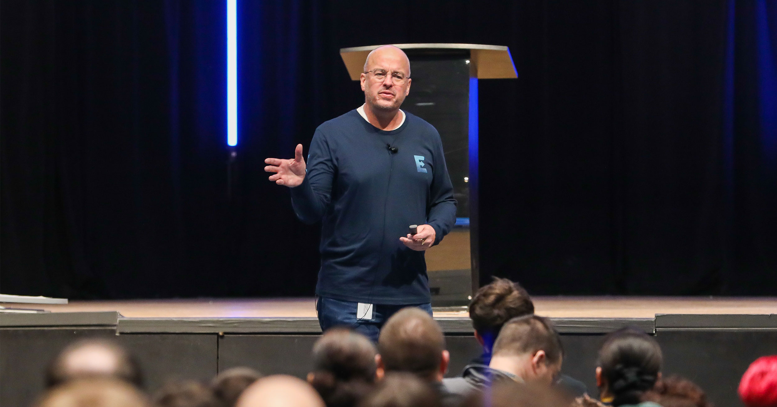 UWM team lead holding a lecture