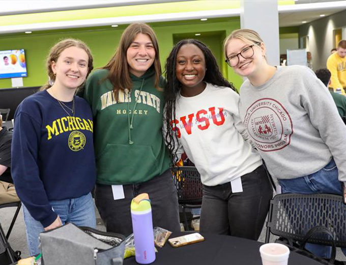 Happy UWM summer team members in the UWM campus gym
