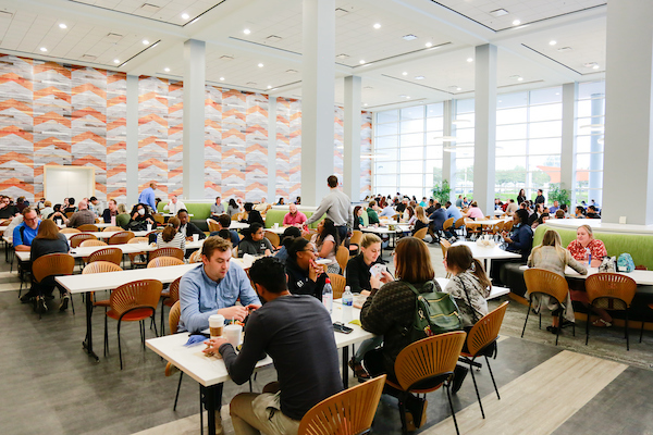 UWM team members eating lunch in the Ucafe